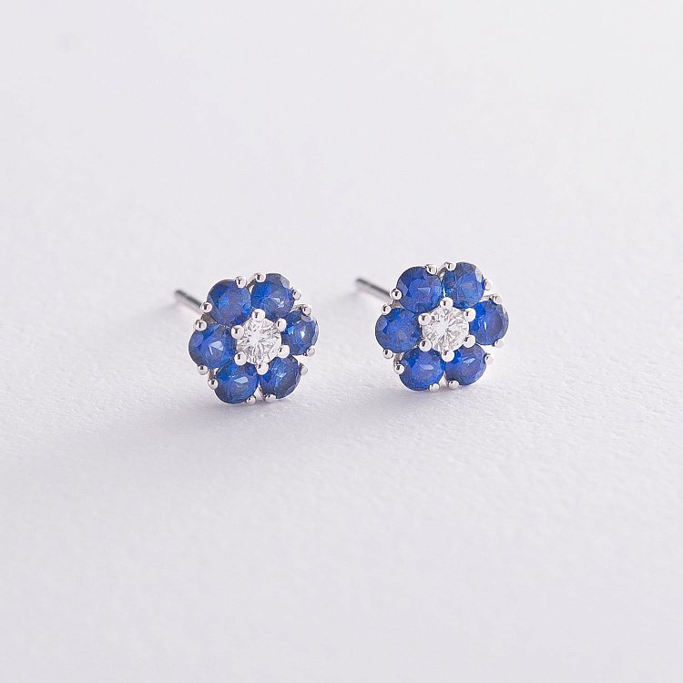 Золоті сережки-пусети "Квіточки" (сапфір, діамант) сб0133vi від ювелірного магазину Онікс