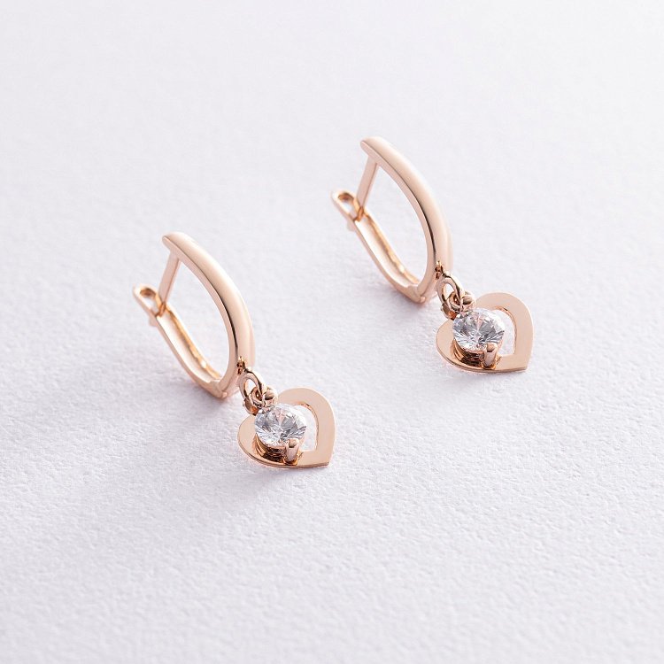 Золотые серьги "Сердечки" с фианитами с07022 от ювелирного магазина Оникс - 1