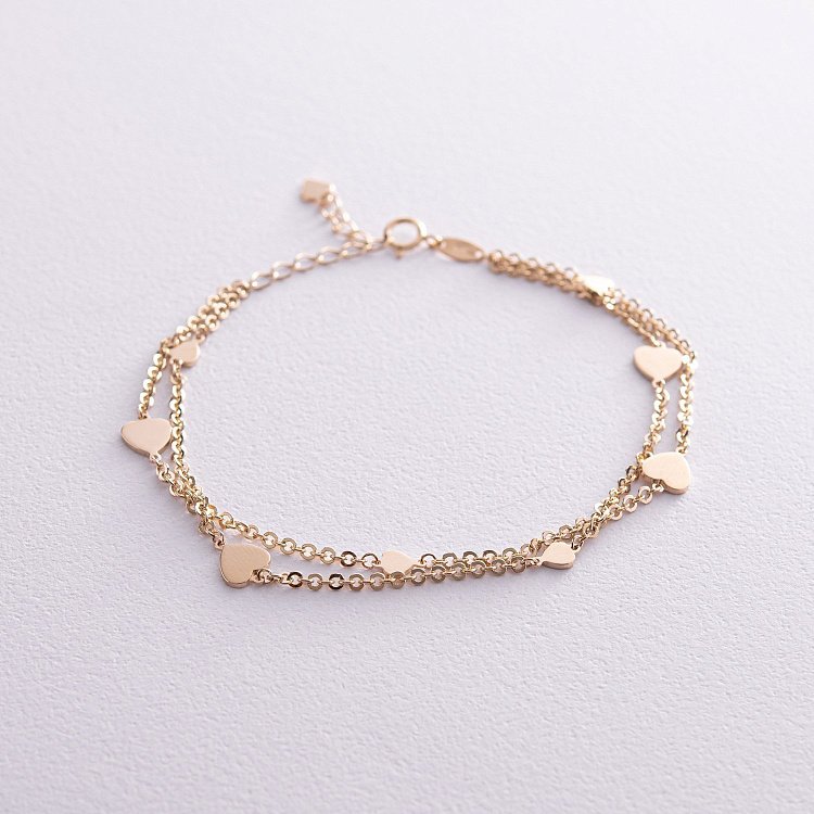 Подвійний браслет "Сердечки" у жовтому золоті б05196 від ювелірного магазину Онікс