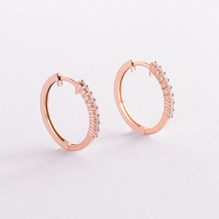 Золотые серьги - кольца с фианитами с07712 от ювелирного магазина Оникс