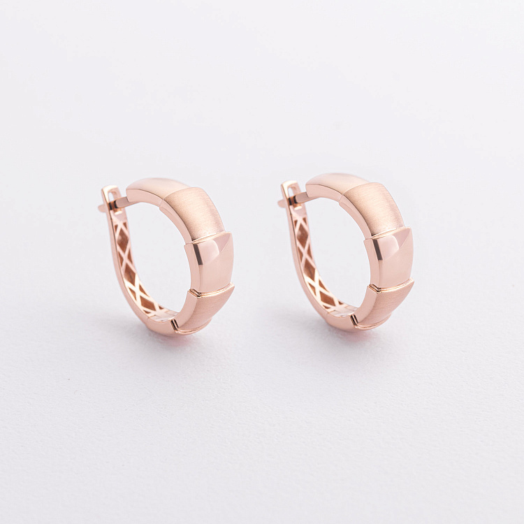 Золотые серьги "Змеи" с09591 от ювелирного магазина Оникс