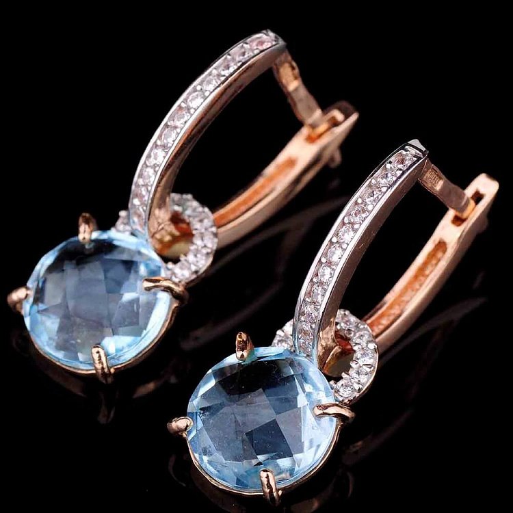 Золоті сережки (блакитний топаз і фіаніти) с02850 від ювелірного магазину Онікс
