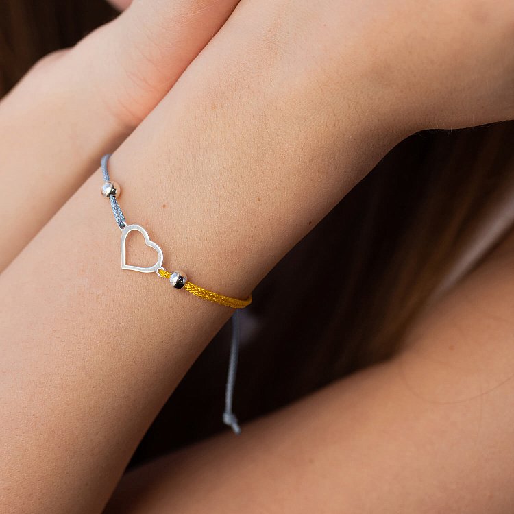 Срібний браслет "Українське серце" (блакитна та жовта нитка) 312/2 від ювелірного магазину Онікс - 2