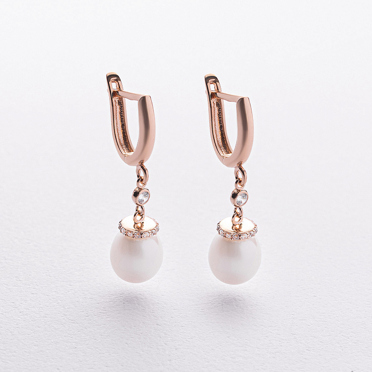 Золотые серьги с жемчугом и фианитами с09690 от ювелирного магазина Оникс