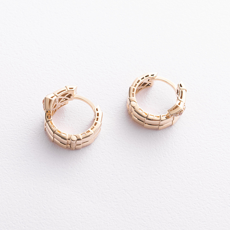 Серьги - кольца "Змеи" в желтом золоте (фианиты) с09717 от ювелирного магазина Оникс - 1