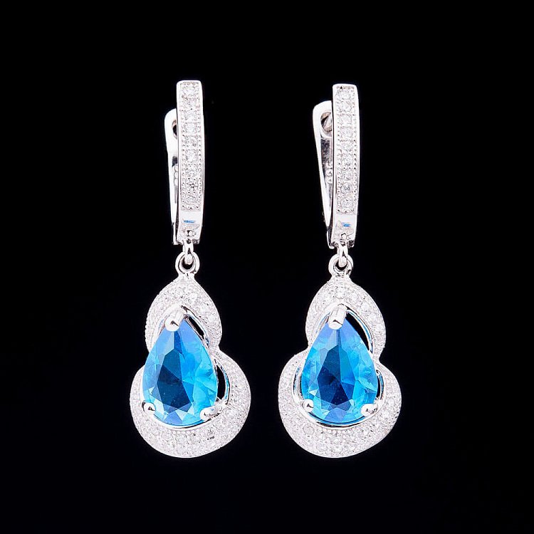 Сережки з синіми фіанітами с032 від ювелірного магазину Онікс - 2