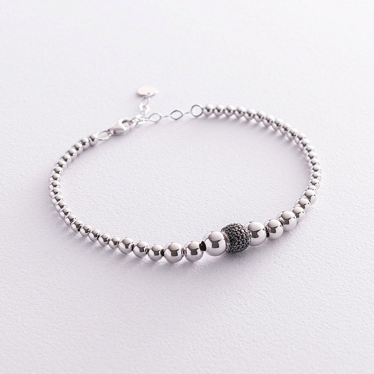 Браслет "Кульки" в білому золоті (чорні фіаніти) б04702 від ювелірного магазину Онікс