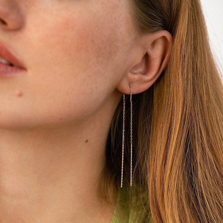 Золоті сережки - протяжки с06700 від ювелірного магазину Онікс