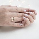 Стильное золотое кольцо без камней к05296 от ювелирного магазина Оникс