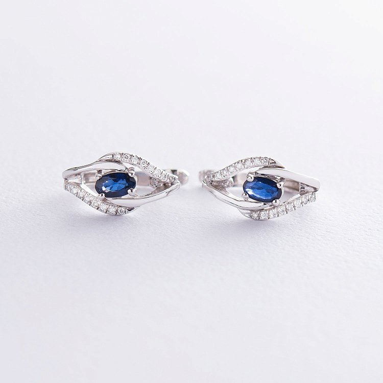 Золоті сережки (сапфір, діамант) C01115E від ювелірного магазину Онікс