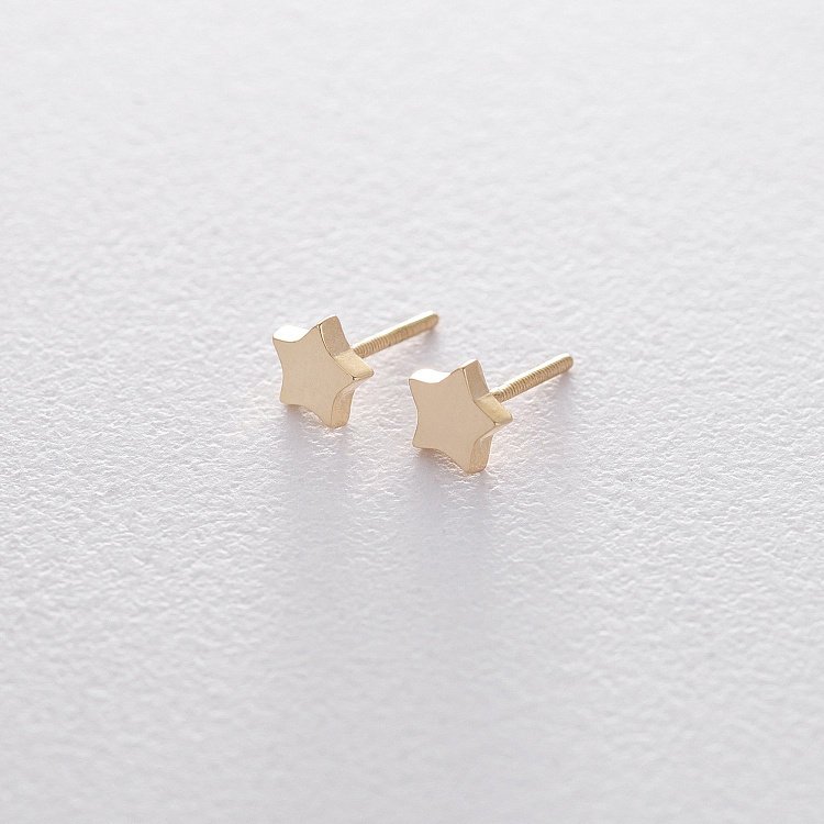 Золотые серьги-гвоздики со звездочками с06193 от ювелирного магазина Оникс
