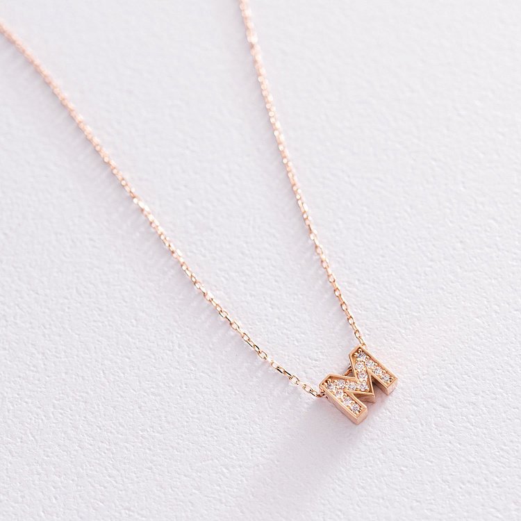 Золоте кольє з літерою "М" (фіаніти) кол01255М від ювелірного магазину Онікс