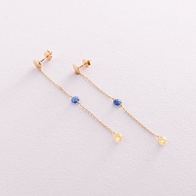 Висячі золоті сережки - пусети "Українка" (блакитні та жовті фіаніти) с08104 від ювелірного магазину Онікс