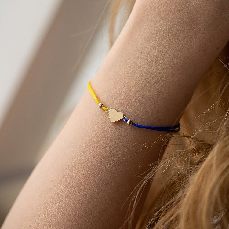 Браслет "Украинское сердце" в желтом золоте (синяя и желтая нить) б05275 от ювелирного магазина Оникс