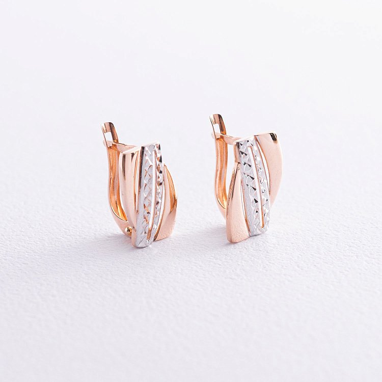 Золоті сережки на англійській застібці с05794 Золоті сережки на англійській застібці с05794 від ювелірного магазину Онікс