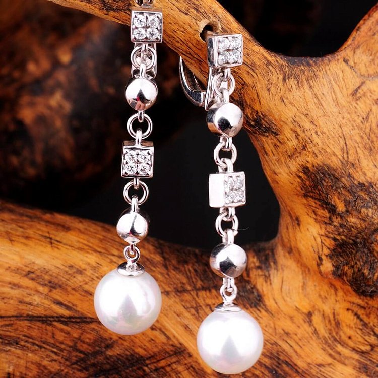 Срібні сережки з культ. прісн. перлами 121299 від ювелірного магазину Онікс