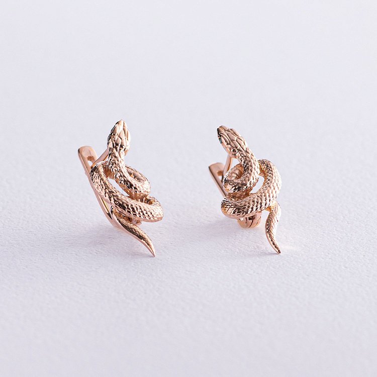 Золотые серьги "Змеи" с07915 от ювелирного магазина Оникс