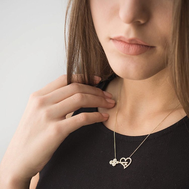 Золоте кольє "Ключик і серце" з фіанітами кол00795 від ювелірного магазину Онікс - 1