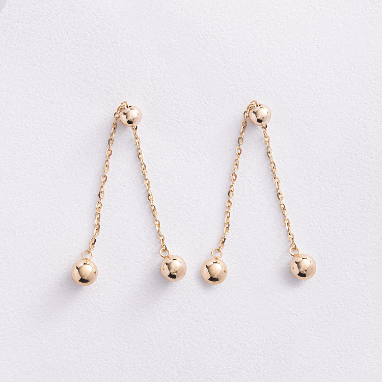 Сережки - пусети з кульками на ланцюжку (жовте золото) 580142м від ювелірного магазину Онікс - 1