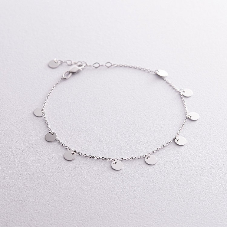 Браслет "Монетки" у білому золоті б05253 від ювелірного магазину Онікс