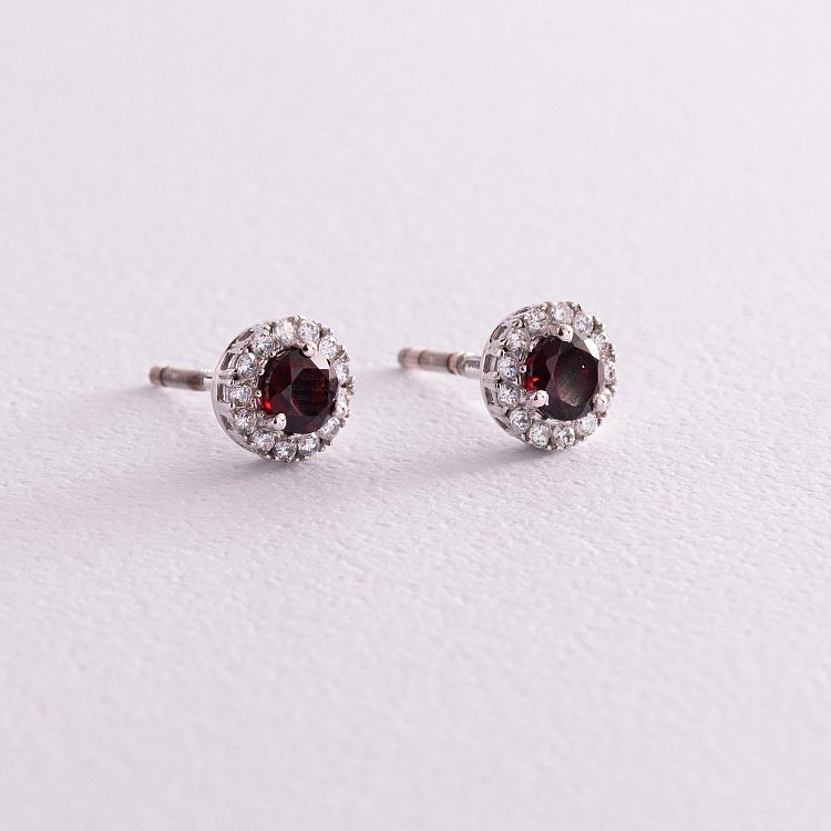 Серебряные серьги - пусеты с пиропами и фианитами 2112/9р-GAR от ювелирного магазина Оникс