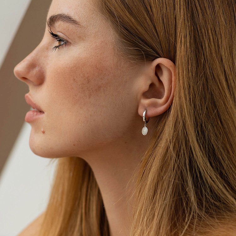 Сережки в білому золоті з діамантами 318461121 від ювелірного магазину Онікс - 1