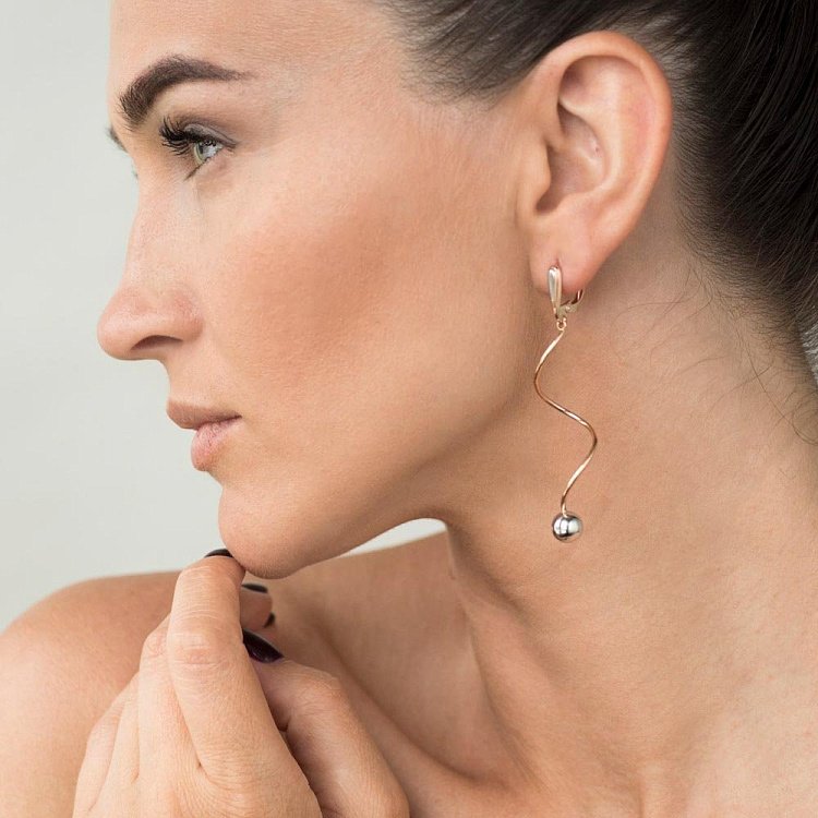 Золоті сережки на англійській застібці с05304 від ювелірного магазину Онікс