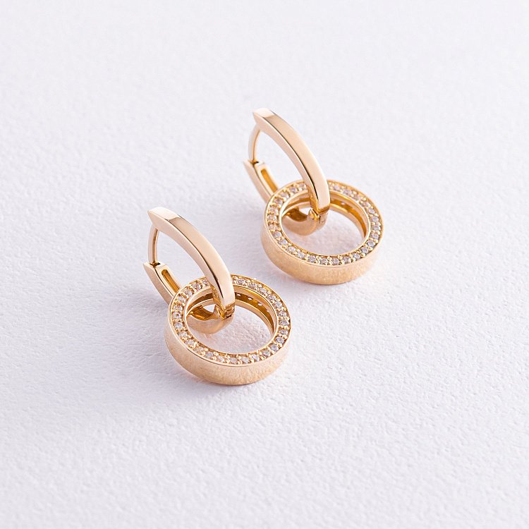 Сережки з кільцями в жовтому золоті (фіаніти) с07875 від ювелірного магазину Онікс - 1