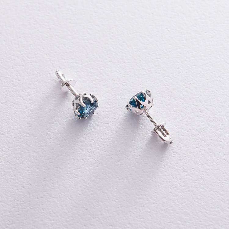 Золоті сережки - пусети (топаз Лондон Блю) с06674 від ювелірного магазину Онікс - 2