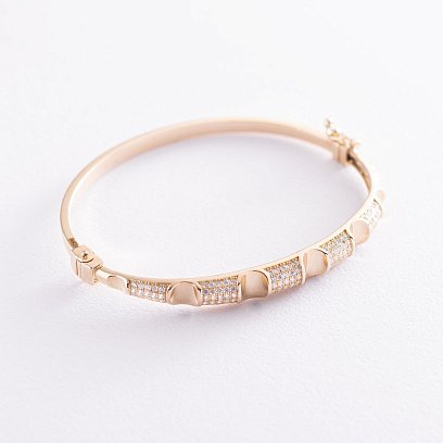 Жорсткий золотий браслет з фіанітами б04491