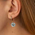 Золоті сережки "Захоплення" з блакитним топазом с08700 от ювелирного магазина Оникс - 1
