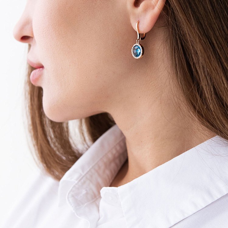 Золоті сережки з блакитними і білими фіанітами с07407 від ювелірного магазину Онікс - 2