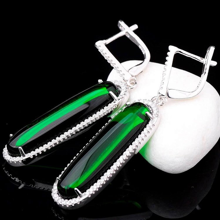 Срібні сережки з фіанітами 121507 від ювелірного магазину Онікс