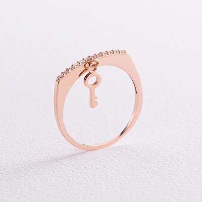 Золота каблучка "Ключик" з фіанітами к07006