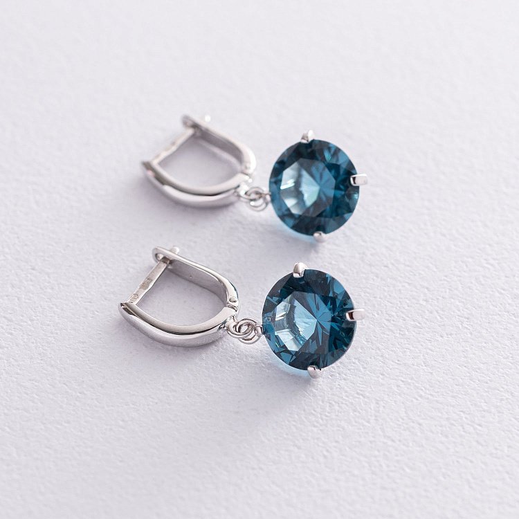 Золоті сережки "Захоплення" з синтетичним топазом Лондон с05285 від ювелірного магазину Онікс - 5