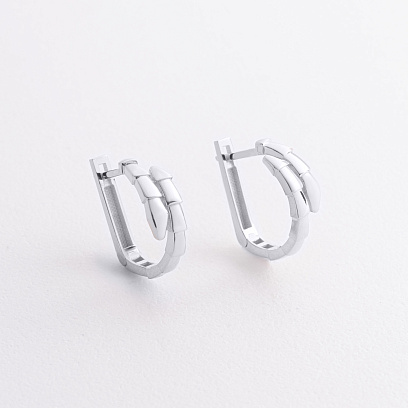 Серьги "Змеи" в белом золоте с09470