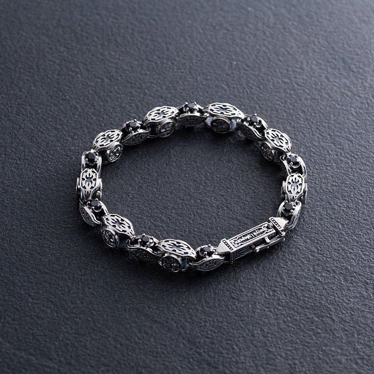 Чоловічий срібний браслет "Врятуй і Збережи" з фіанітами 1000б Чоловічий срібний браслет "Врятуй і Збережи" з фіанітами 1000б від ювелірного магазину Онікс