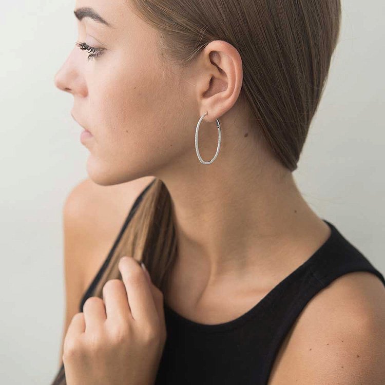 Золотые серьги "Кольца" с бриллиантами dgmp00508 от ювелирного магазина Оникс