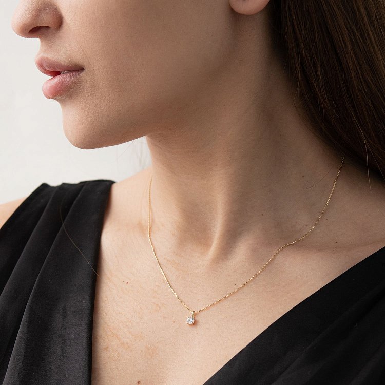 Золотое колье с фианитом кол00790 от ювелирного магазина Оникс - 1