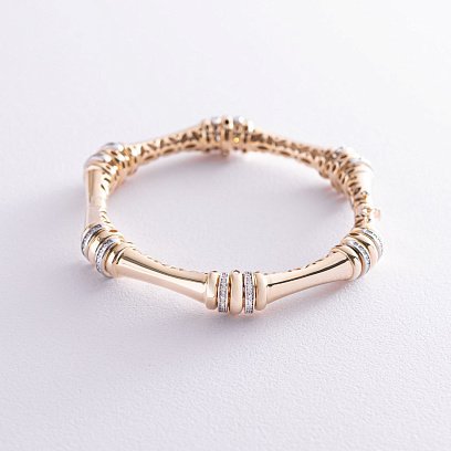 Жесткий браслет в желтом золоте с фианитами б04474