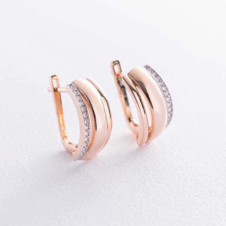 Золоті сережки з фіанітами с06841 від ювелірного магазину Онікс