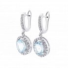 Срібні сережки з блакитним топазом і фіанітами 121460 от ювелирного магазина Оникс - 1