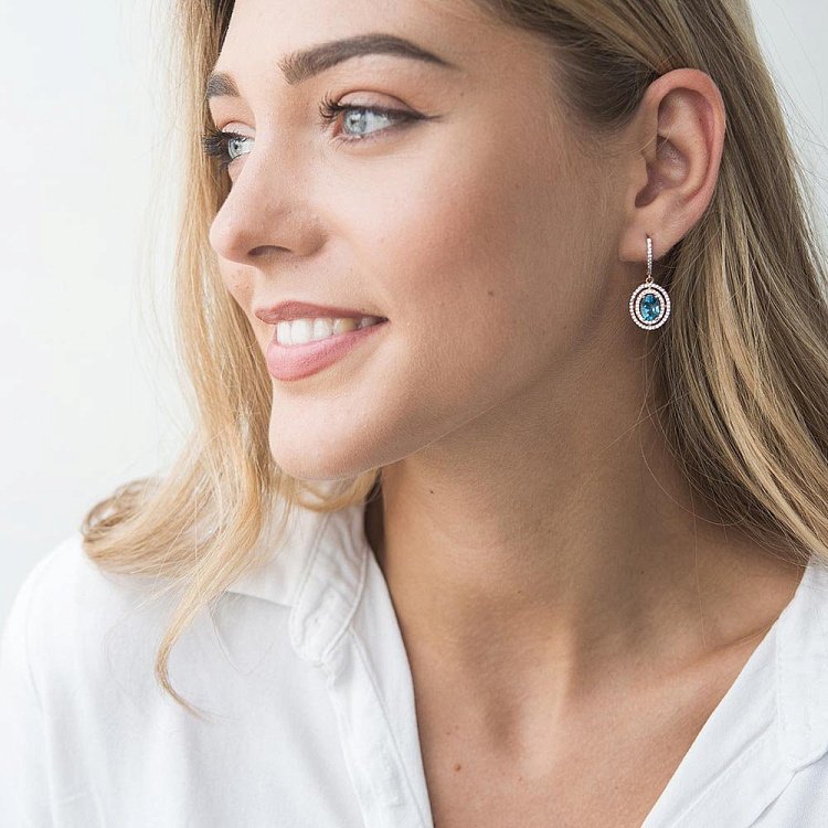 Золоті сережки з блакитним топазом і фіанітами с04187 від ювелірного магазину Онікс - 2