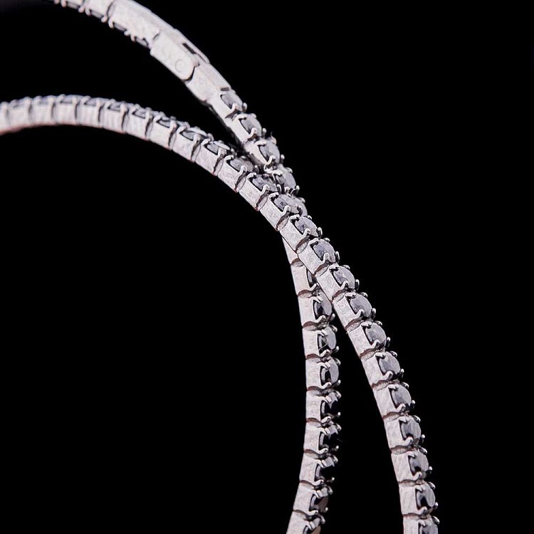 Золоті сережки "Кільця" з чорними фіанітами TNSCIONECCB0b від ювелірного магазину Онікс - 2