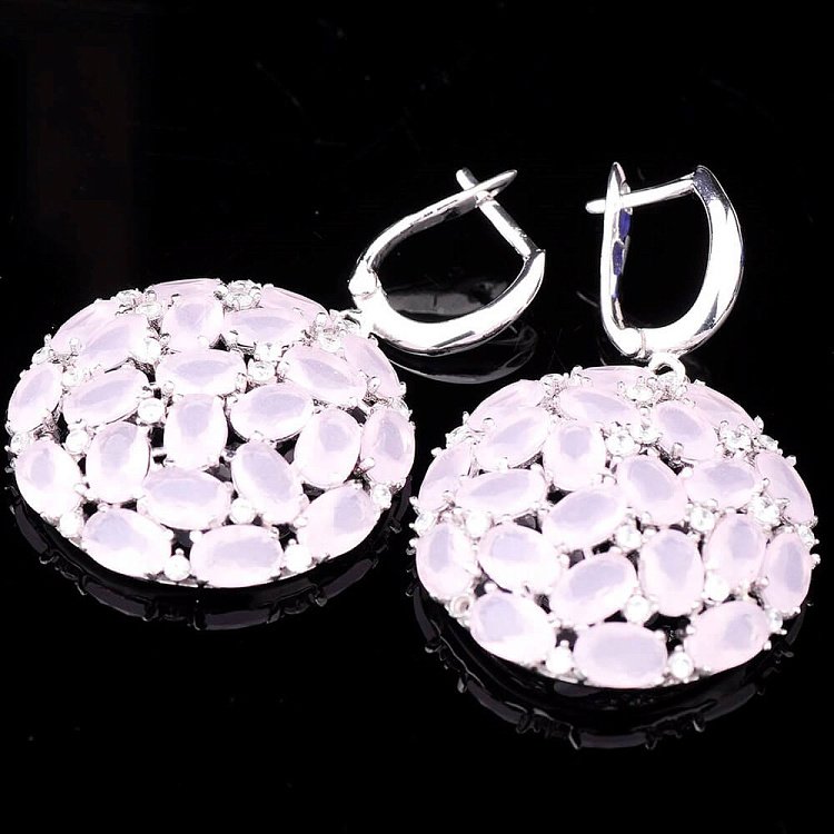 Серебряные сережки с фианитами 121509 от ювелирного магазина Оникс