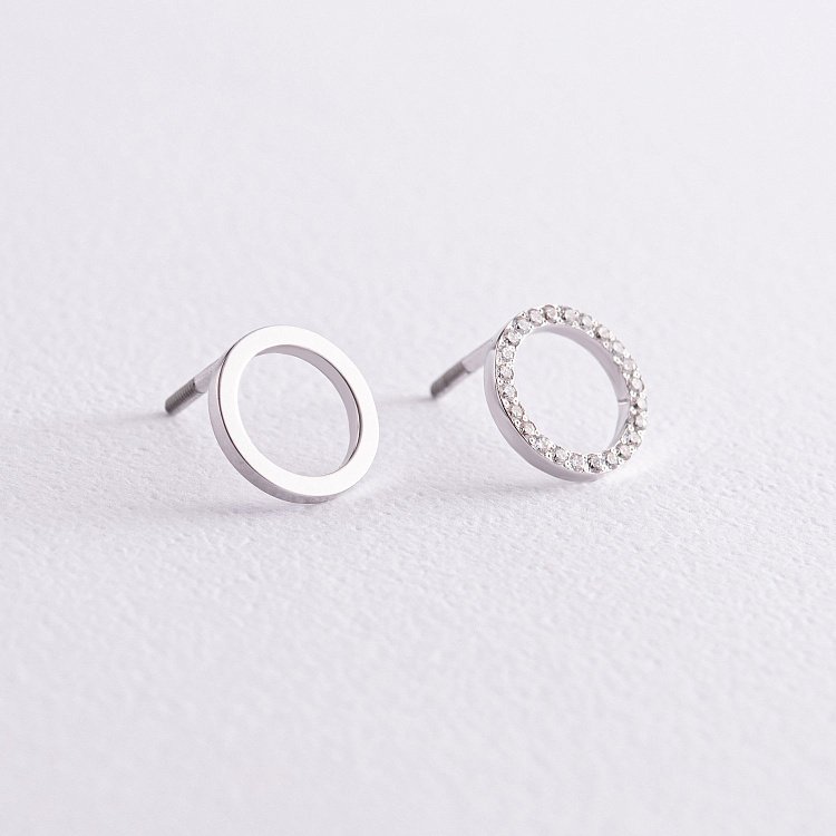 Золотые серьги - пусеты "Круговорот" с бриллиантами 317121121 от ювелирного магазина Оникс