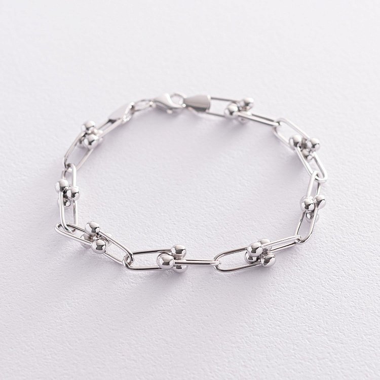 Браслет "Фантазія" в білому золоті б04677 від ювелірного магазину Онікс