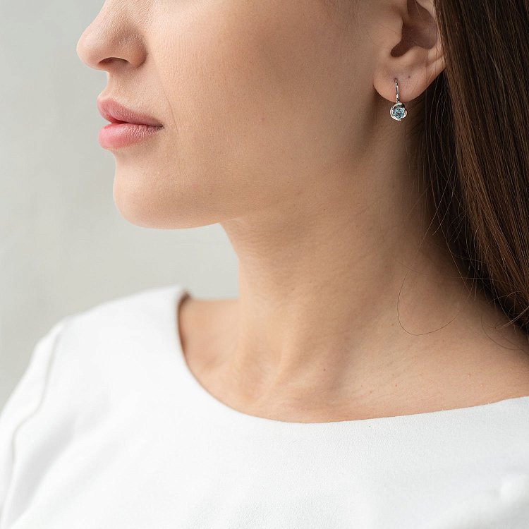 Золоті сережки з блакитним топазом с02407 від ювелірного магазину Онікс - 1