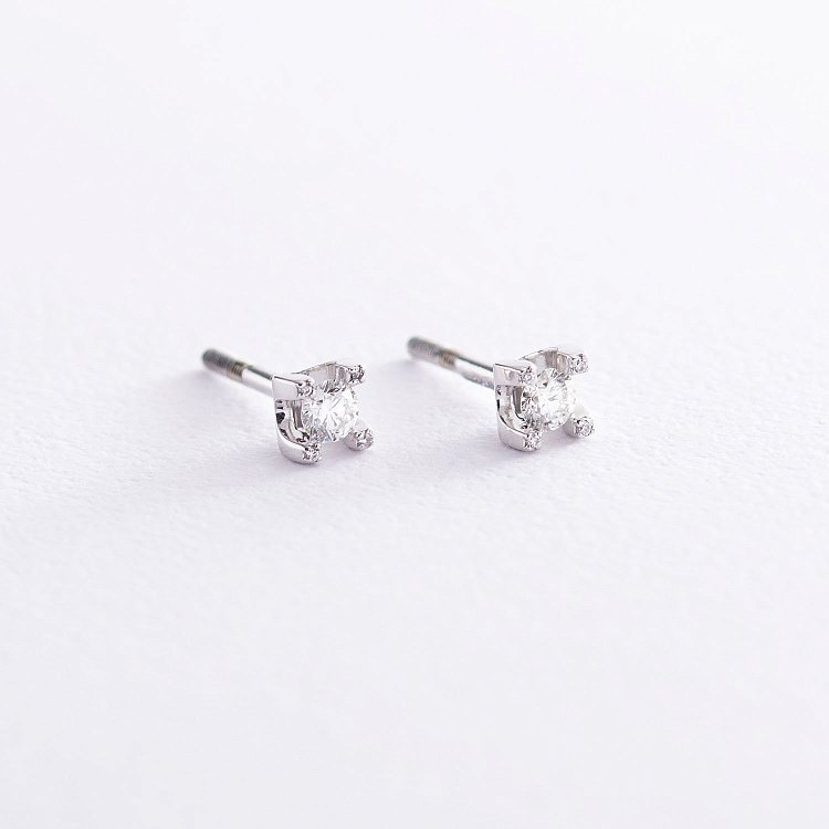 Золоті сережки - пусети з діамантами с2723 від ювелірного магазину Онікс