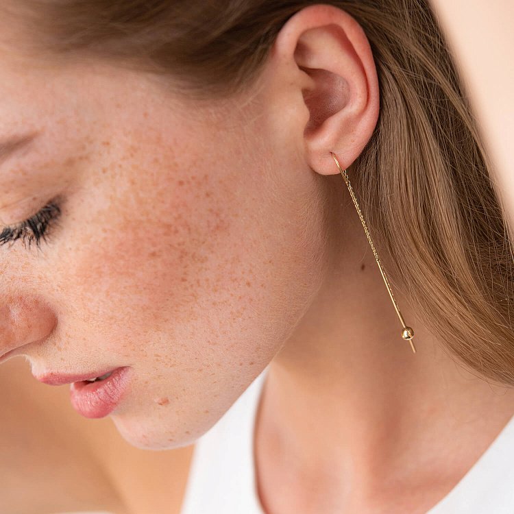 Серьги "Шарики" в желтом золоте на цепочке с07984 - 1 Серьги "Шарики" в желтом золоте на цепочке с07984 от ювелирного магазина Оникс - 1